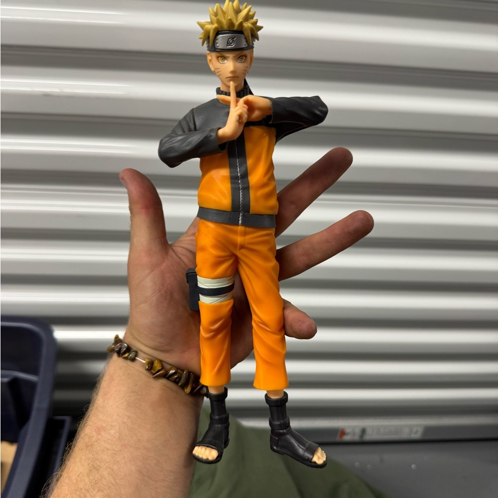 Orange and Black Anime Figure